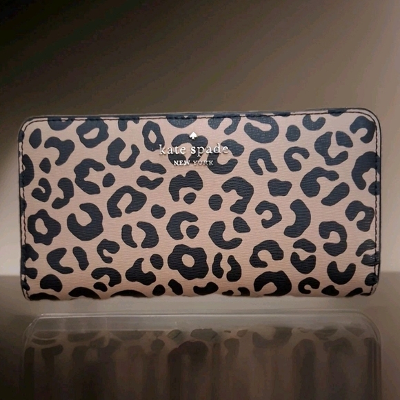 kate spade Handbags - Kate Spade Darcy Large Slim Bifold Leopard Print Wallet